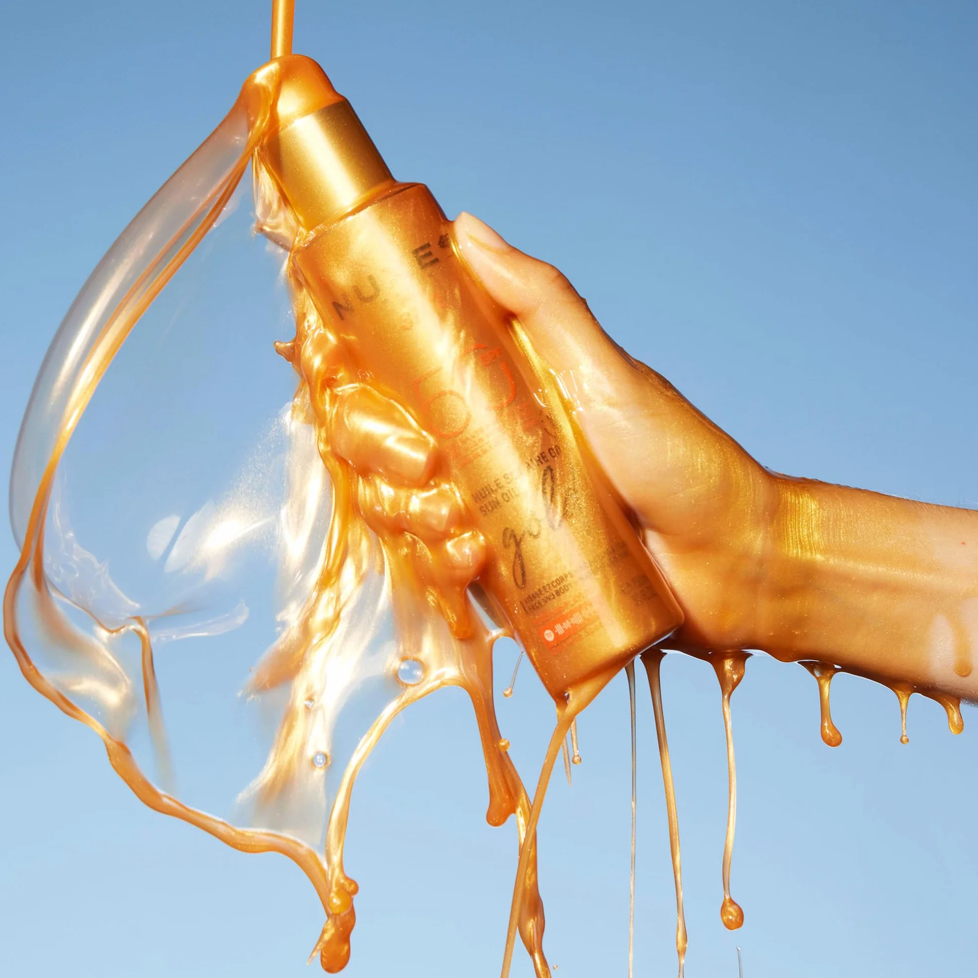 Nuxe Sun Gold Olio Abbronzante SPF50 150 ml, Olio Solare Protettivo, Protegge Viso e Corpo da UVA/UVB e Luce Blu, Previene Macchie Scure e Segni dell'Invecchiamento, Formula Resistente all'Acqua