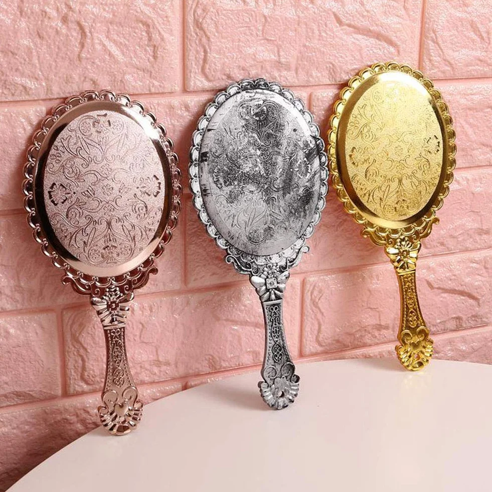 Specchio cosmetico portatile vintage oro rosa dorato