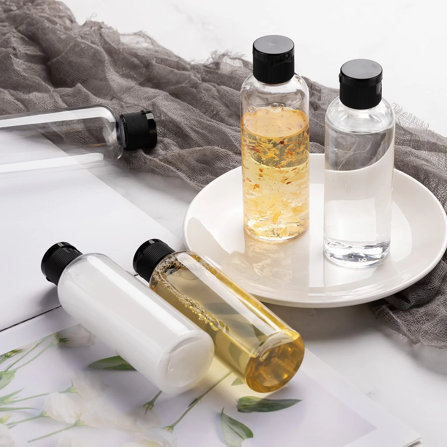 Toureal 100ML Bottiglie Vuoto da Viaggio con Tappo Flip Top (5 Pezz) Flaconi per Cosmetici (Trasparente)
