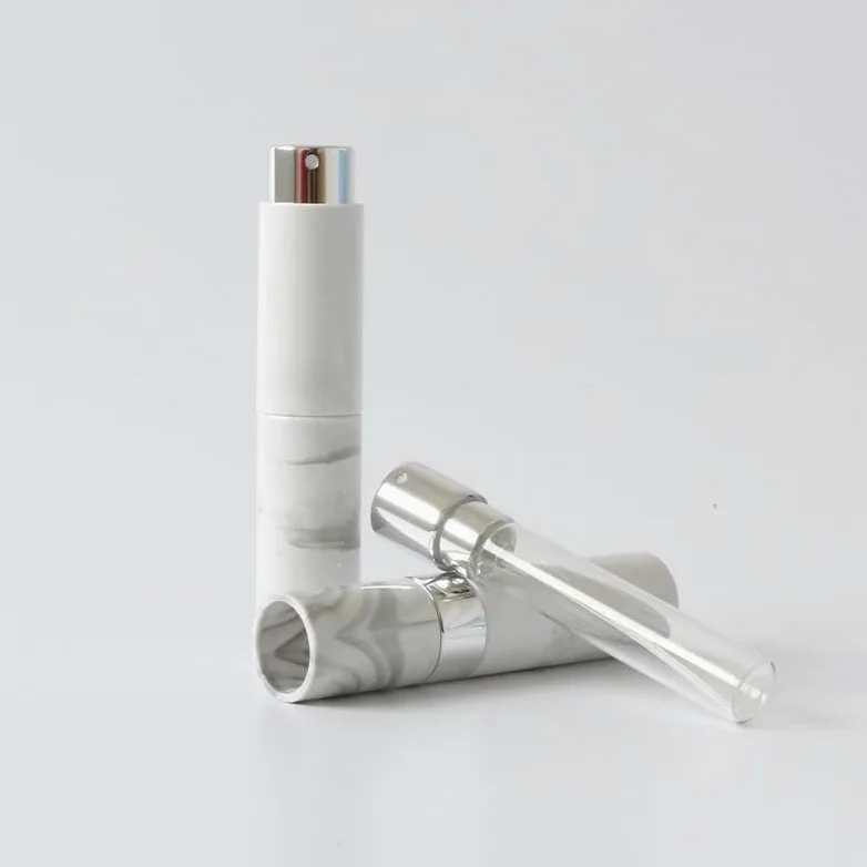 Mini Bottiglie di Profumo da Viaggio, Atomizzatore di Profumo 2 Pezzi 10ML Mini Profumo Spray Bottiglia Vuota Custodia in plastica Fodera in Vetro Ricaricabile Modello in Marmo da Viaggio Contenitore
